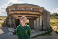 Kyle and bunker at Pointe Du Hoc, Normandy, France