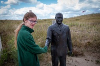 Kyle with Higgins statue at Utah Beach in Normandy