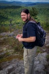 Paul hiking Coney Mountain in Tupper Lake, NY