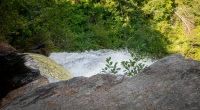 At the edge of OK Slip Falls  along the OK Slip Falls train in Indian Lake NY