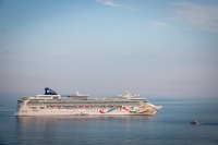 Norwegian Dawn seen from Voyager of the Seas arriving in Visby