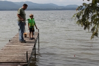 Kyle and Grandpa fishing from our dock