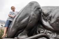 Kyle on the base of Nelson's Column in Trafalgar Square in London