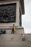 Kyle on the base of Nelson's Column in Trafalgar Square in London