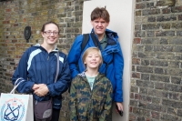 Suzanne, Kyle and Paul standing on the Prime Meridian at the Royal Observatory in Greenwich