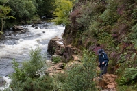 Suzanne hiking along the Aberglaslyn Gorge