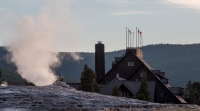 Old Faithful Geyser and Old Faithful Inn in Yellowstone