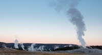 Sunrise at Old Faithful Geyser in Yellowstone