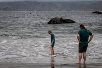 Kyle and Paul wading at Mile Rock Beach on Lands End Trail in San Francisco