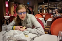 Kyle at Christmas dinner in Silk Main Dining Room on Anthem of the Seas