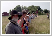 Line of (tourists) soldiers on the battlefield