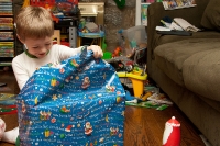 Kyle opeing Christmas Presents