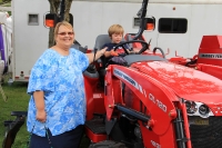 Kyle loved the tractors at the fair