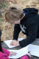 Kyle doing a leaf rubbing