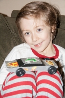 Kyle with his Pinewood Derby Car