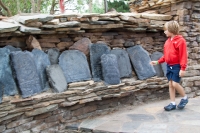 Kyle looking at Tibetan plaques