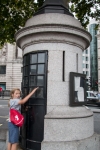 Kyle and London's smallest police station in Trafalgar Square in London