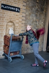 Kyle at Platform 9 3/4 at Kings Cross Station in London