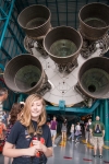 Kyle with Saturn 5 rocket at Kennedy Space Center