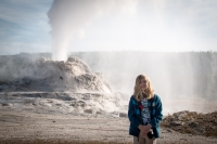 Kyle with Eruption of Castle Geyser in Yellowstone