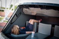 Kyle in Apollo module at Kennedy Space Center