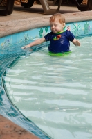 Kyle walking around the kidde pool