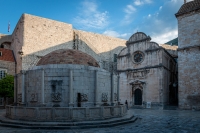 Big Onforio's Fountain and St. Saviour chuch in the morning in Dubrovnik